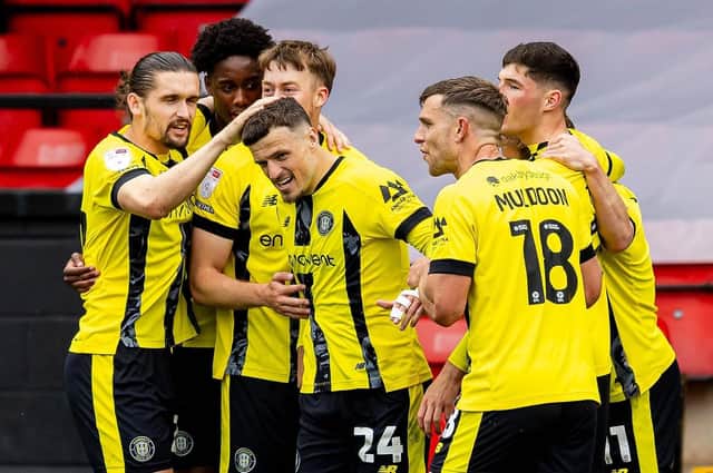 Josh March is congratulated by his Harrogate Town team-mates after netting a 22nd-minute equaliser against Walsall. Pictures: Manjit Narotra/ProSportsImages