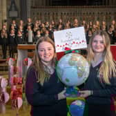 Pictured: Wensleydale School students Millie Gilbey and Jessica Arnott with their school’s globe.