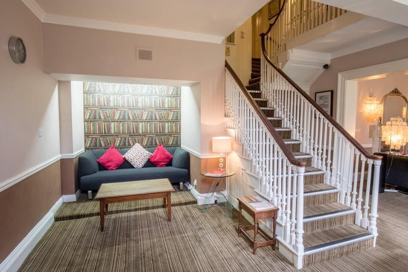 The overall decor of the lobby and staircase was lighter in colour before the renovation.