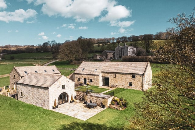 Externally, the property is approached via a sweeping driveway guarded by an electrically operated five bar gate, beyond which the drive splits, one leading to a large parking area for several cars and the other to the main house and living areas.