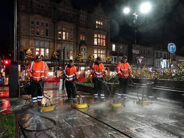 Harrogate Business Improvement District's street cleaning crew back in town power washing streets ahead of the Christmas season.