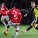 Dean Cornelius slots home Harrogate Town's first goal during Tuesday night's 2-2 draw at home to Wrexham. Pictures: Matt Kirkham