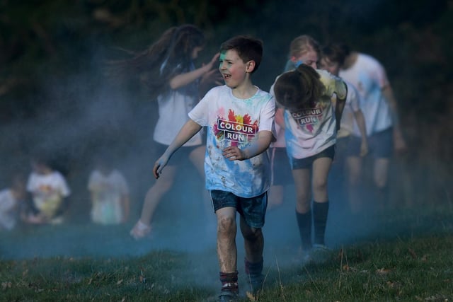 Children take part in the colour run.