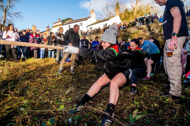 Since it was first launched by a group of friends in 1968, the Boxing Day tug of war competition between the Half Moon Inn and Mother Shipton Inn has seen eight-strong teams of men and women battle it out by the riverside at the Low Bridge in Knaresborough. (Picture James Hardisty)