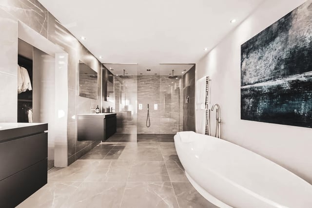 The modern en-suite bathroom has two-way his and hers showers.