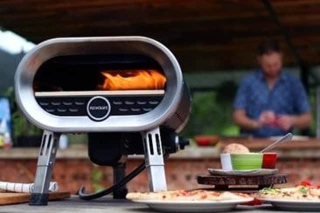 Summer's coming: The Revolve Pizza Oven makes cooking pizza enjoyable, easy and social.