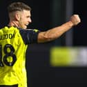 Jack Muldoon celebrates after finding the net during Harrogate Town's 1-1 draw against Swindon on Saturday afternoon. Pictures: Matt Kirkham