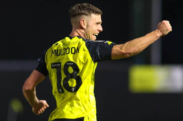 Jack Muldoon celebrates after finding the net during Harrogate Town's 1-1 draw against Swindon on Saturday afternoon. Pictures: Matt Kirkham