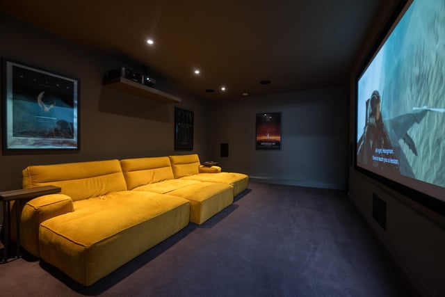 A luxury cinema room is on the lower ground floor of the property.