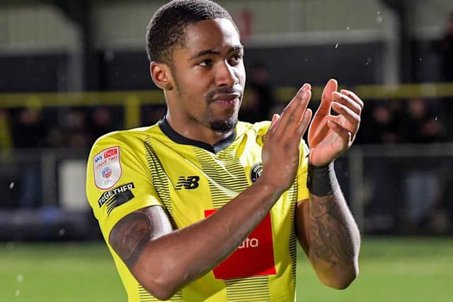 Kayne Ramsay applauds the Harrogate Town fans following Boxing Day's 3-2 win over Grimsby Town.