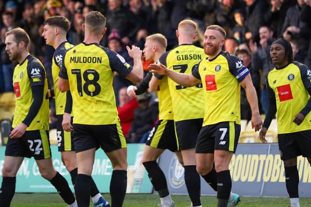 Harrogate Town players celebrate the first goal of their 3-1 League Two win against Notts County last weekend. Pictures: Matt Kirkham