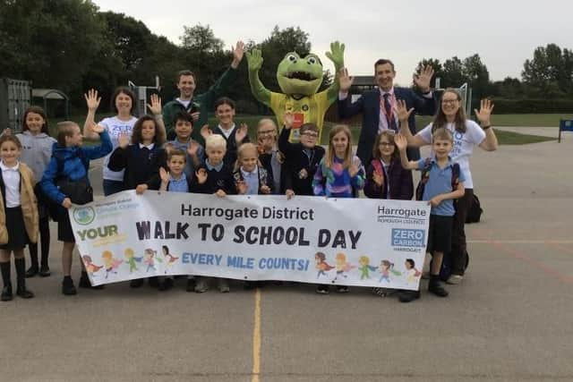 Rossett Acre Primary School pupils with Richard Sheriff, Director of Red Kite Alliance and CEO of Red Kite Learning Trust, and Zero Carbon Harrogate's Jemima Parker.