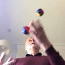 Dr Keith Souter juggling.