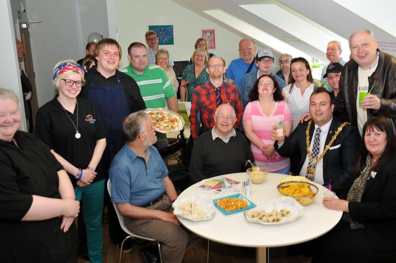The Mayor of Hartlepool Councillor Stephen Akers-Belcher (sitting centre right) raises a glass at the opening of the Creative Cafe, as invited guests look on. Who do you recognise in this photo from 8 years ago?
