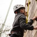 Taking on the Climbing wall