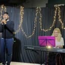Rohan Johar (left) and Angeline Johns Bjerregaard (right) performing at Roosters Brewery and Taproom
