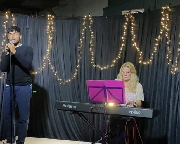 Rohan Johar (left) and Angeline Johns Bjerregaard (right) performing at Roosters Brewery and Taproom