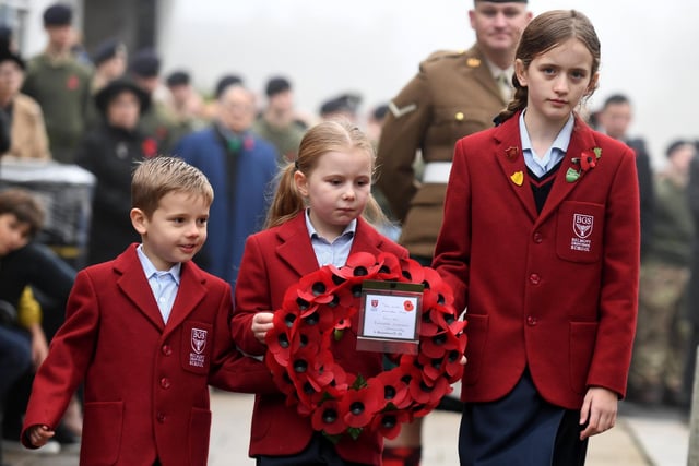 Belmont Grosvenor School pupils lay a wreath at the War Memorial