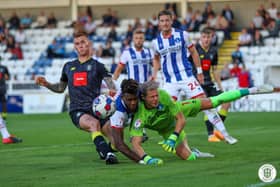 Harrogate Town were beaten 2-0 in their opening EFL Trophy group game at Hartlepool United on Tuesday night.