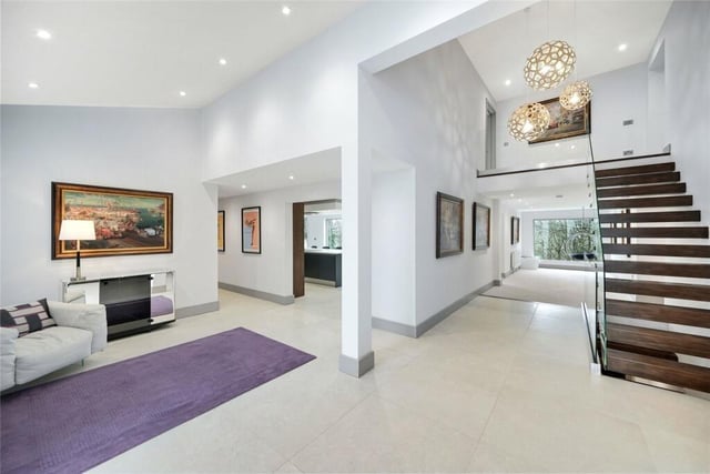 The open plan interior with hallway and reception rooms.