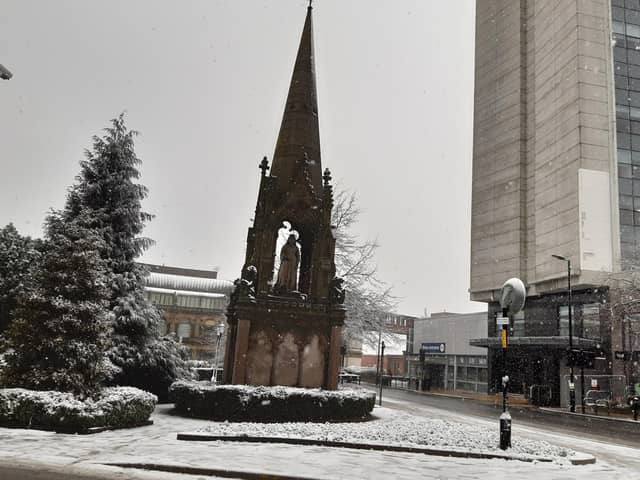 Winter snow falling near the Queen Victoria Jubilee Memorial on Station Parade in Harrogate earlier today, Thursday. (Picture Graham Chalmers)
