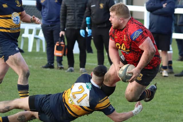 Harry Butler is tackled by a visiting player during Saturday's Yorkshire One clash at the Jim Saynor Ground.