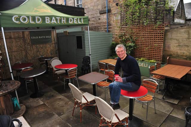 Writer Peter Woolrich in his outside dinning area at the Cold Bath Deli, Harrogate back in 2021 when he was writing his debut novel. (Picture Gerard Binks)