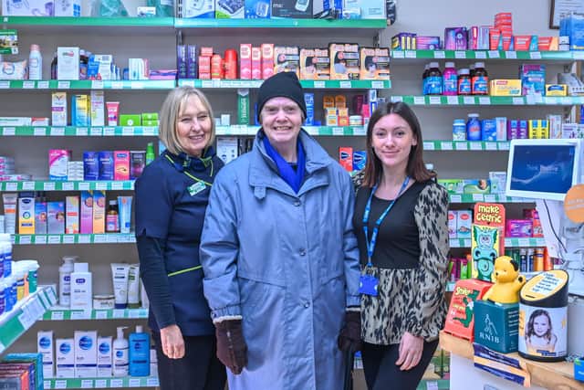 Pictured: Margaret Peacock thanks the staff at the Pateley Bridge Chemist.