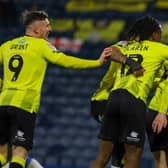 Luke Armstrong, right, is congratulated by his team-mates after firing Harrogate Town into a 2-1 lead against Rochdale. Pictures: Matt Kirkham