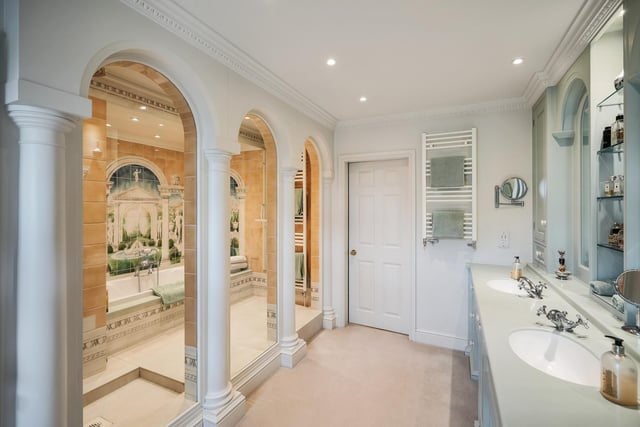 A luxurious en suite bath and shower room within the property.