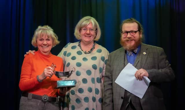 Sandra Smallwood of Woodlands Drama Group receiving the best actress trophy last year