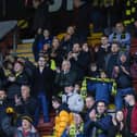 Harrogate Town supporters enjoy Saturday's FA Cup first-round win over Bradford City at Valley Parade. Pictures: Matt Kirkham