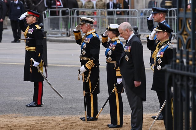 King Charles III, Princess Anne, Princess Royal, Prince Andrew, Duke of York and Prince Edward, Earl of Wessex prepare to walk behind The Queen's funeral cortege. (Photo by Geoff Pugh - WPA Pool/Getty Images)