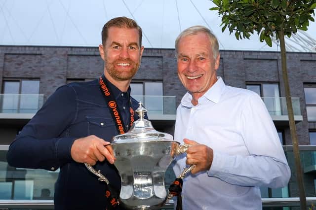 Harrogate Town manager Simon  Weaver, left, and chairman, Irving Weaver, with the 2019/20 National League play-off final winners' trophy . Picture: Matt Kirkham