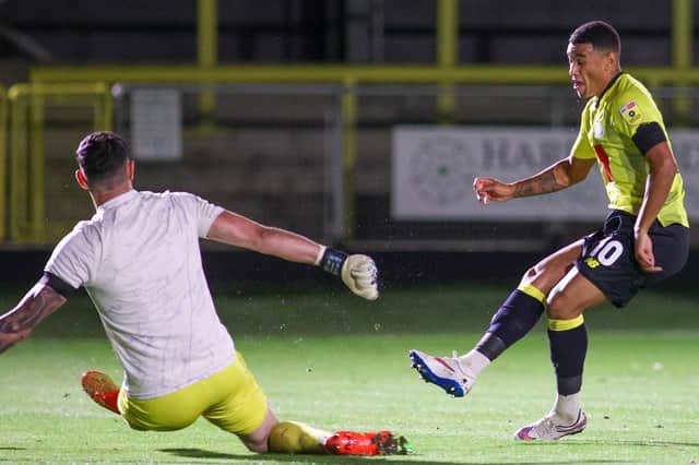 Harrogate Town's Josh Coley fails to get the better of Salford City goalkeeper Tom King during Tuesday evening's League Two clash at Wetherby Road. Pictures: Matt Kirkham