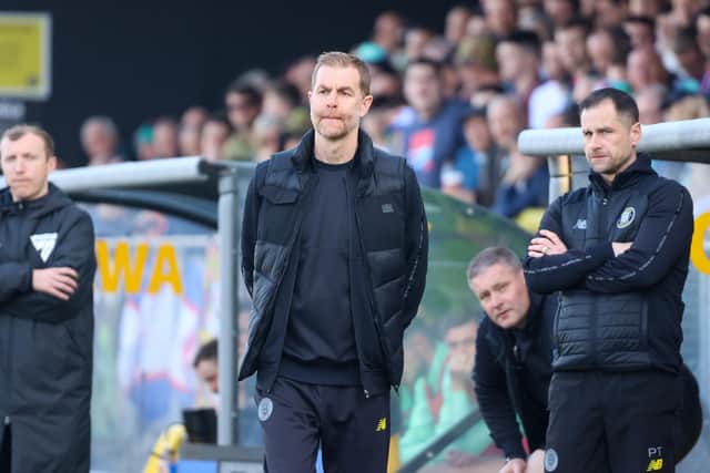 Sulphurites boss Simon Weaver, centre, has fitness concerns over two of his defenders ahead of Saturday's League Two clash with Gillingham.