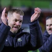 Simon Weaver applauds Harrogate Town's travelling fans following Saturday's 4-1 League Two triumph at Rochdale. Pictures: Matt Kirkham
