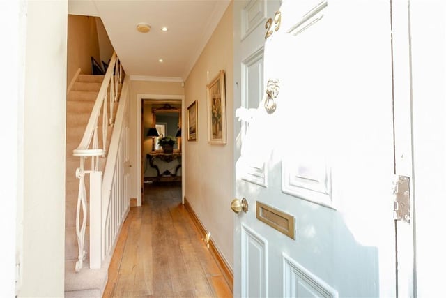 A bright and welcoming hallway leads in to the property.