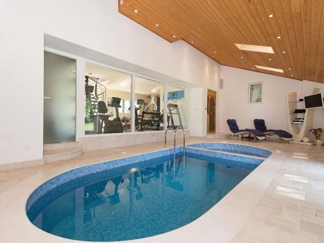One of the property's luxury features is a swimming pool and bathing area.