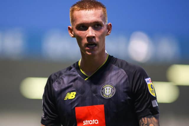 Centre-half Kyle Ferguson was handed his first League Two start as Harrogate Town won 2-0 at Gillingham on Tuesday evening.