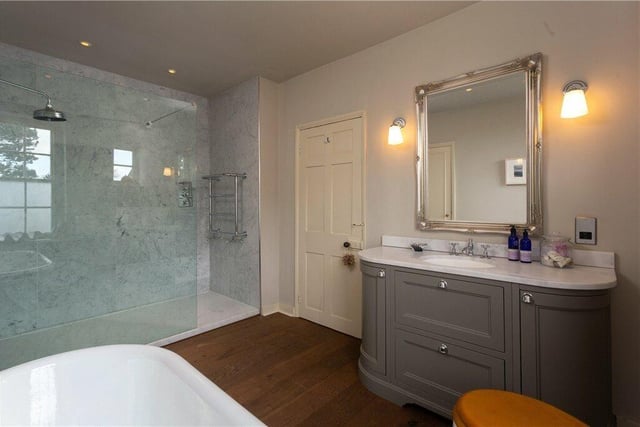 This luxurious bathroom is one of four in the property.