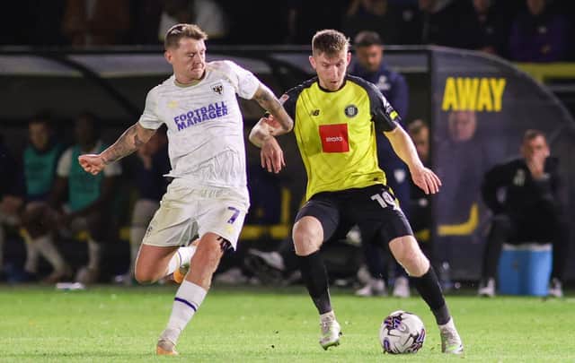 Matty Daly on the attack for Harrogate Town during Tuesday night's 1-0 home defeat to AFC Wimbledon. Pictures: Matt Kirkham