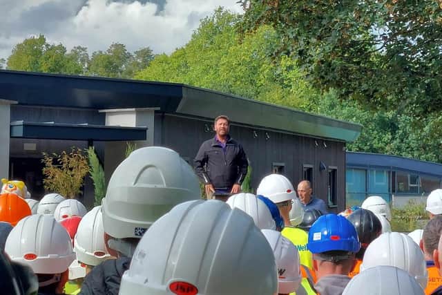 Nick Knowles, BBC TV's DIY SOS presenter with tradespeople who contributed to the build for Children in Need. (Picture contributed)