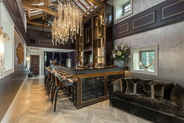 This bar area has a bespoke display wall.