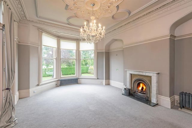 This incredible home has three large reception rooms with windows overlooking the garden and Stray