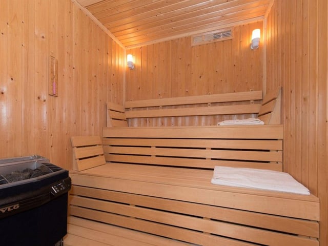 Leading on from the swimming pool is a good sized sauna room.