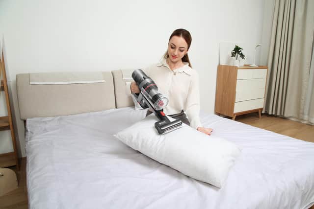 The P11 features a mini-motorised tool that can remove stubborn dust on beds, sofas and pillows. Image: Proscenic