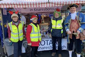 Knaresborough Town Crier joined Rotarians manning the tombola stalls and more at this year's Knaresborough Christmas Markets. (Picture contributed)