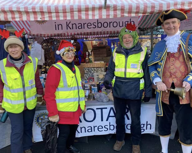 Knaresborough Town Crier joined Rotarians manning the tombola stalls and more at this year's Knaresborough Christmas Markets. (Picture contributed)