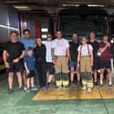 Jay Taylor and Robyn Foster pictured at the end of their FireCallRun in Richmond with the station crew